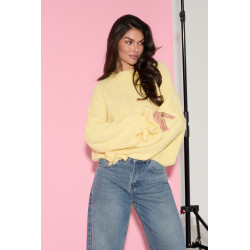 Oversizowy sweter z wiązaniami na rękawach