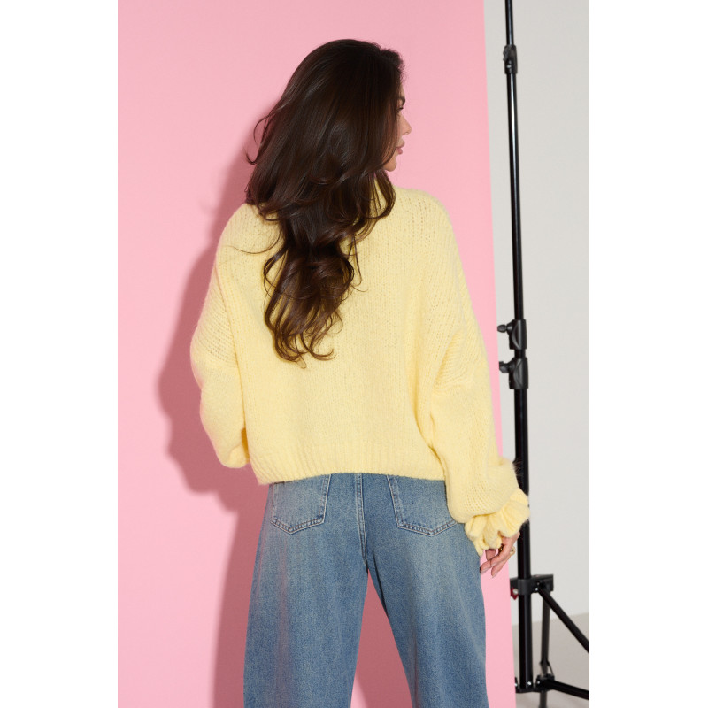 Oversizowy sweter z wiązaniami na rękawach