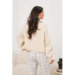 Oversizowy sweter z wiązaniami na rękawach