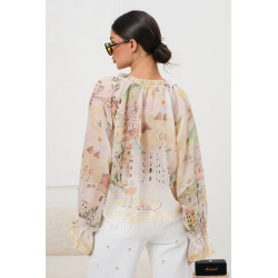 Bluzka z pastelowym nadrukiem i wiązanymi rękawami