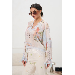 Bluzka z pastelowym nadrukiem i wiązanymi rękawami