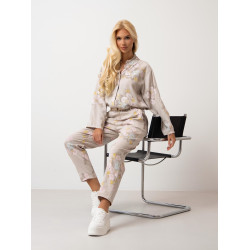 Spodnie w pastelowe kwiaty z paskiem