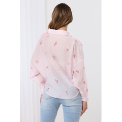 Bluzka kopertowa z motywem kwiatowym i koronkowym wykończeniem