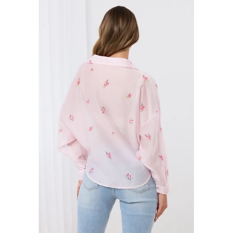 Bluzka kopertowa z motywem kwiatowym i koronkowym wykończeniem